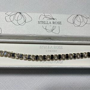 New STELLA ROSE black & clear crystal tennis bracelet. Strong clasp. Gold plated